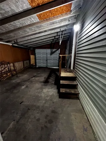 a kitchen view with wooden cabinets and stainless steel appliances