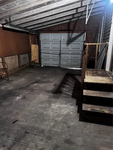 a front view of a house with yard and green space