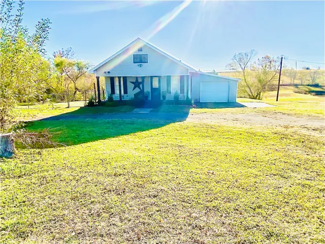 a view of a swimming pool with an outdoor space