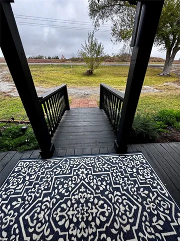 a view of balcony with ocean view