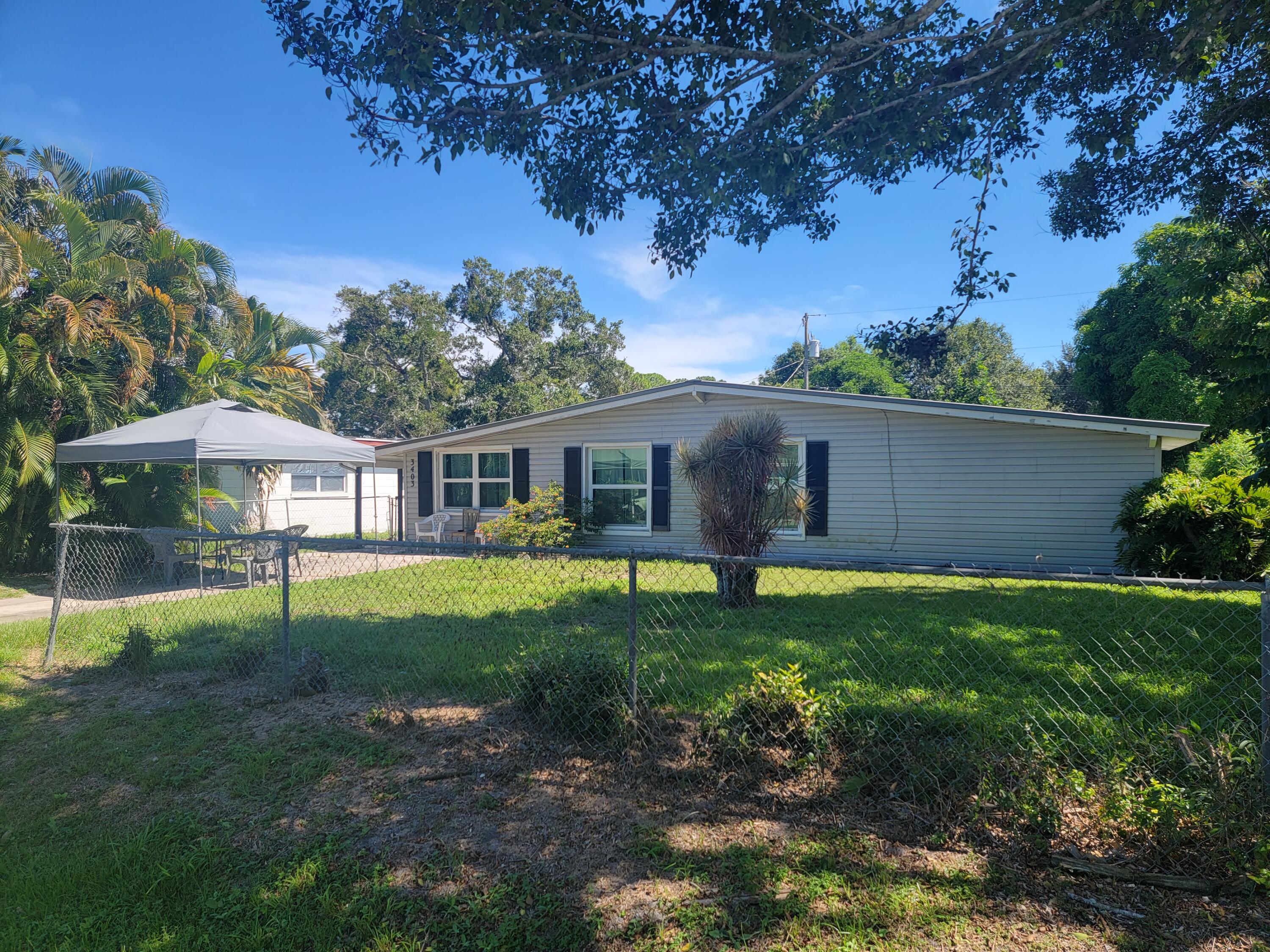 3403 Sloan Road Fort Pierce, FL 34947 - Photo 2 of 30 20220822_154244