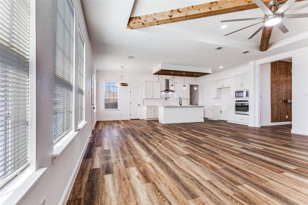 2612 Burchill Road Fort Worth, TX 76105 - Photo 5 of 25 a view of kitchen and utility room