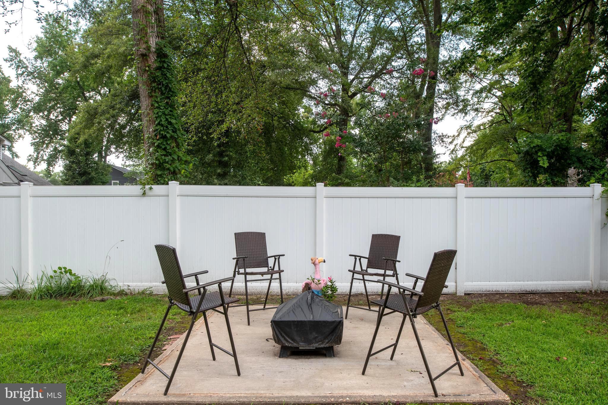 133 7th Street Colonial Beach, VA 22443 - Photo 11 of 72 a view of backyard with furniture and garden