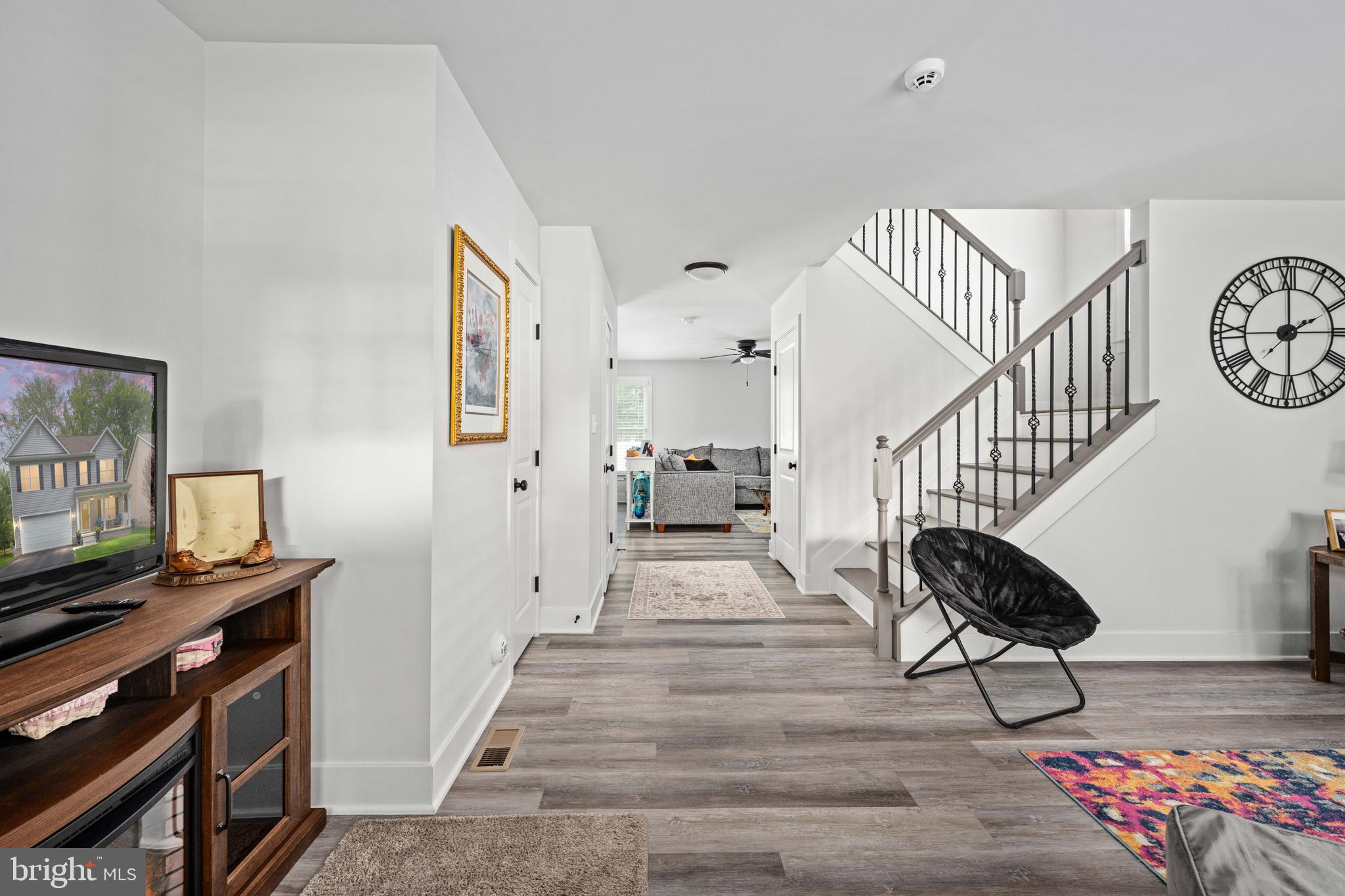 133 7th Street Colonial Beach, VA 22443 - Photo 15 of 72 a view of entryway and hall with wooden floor