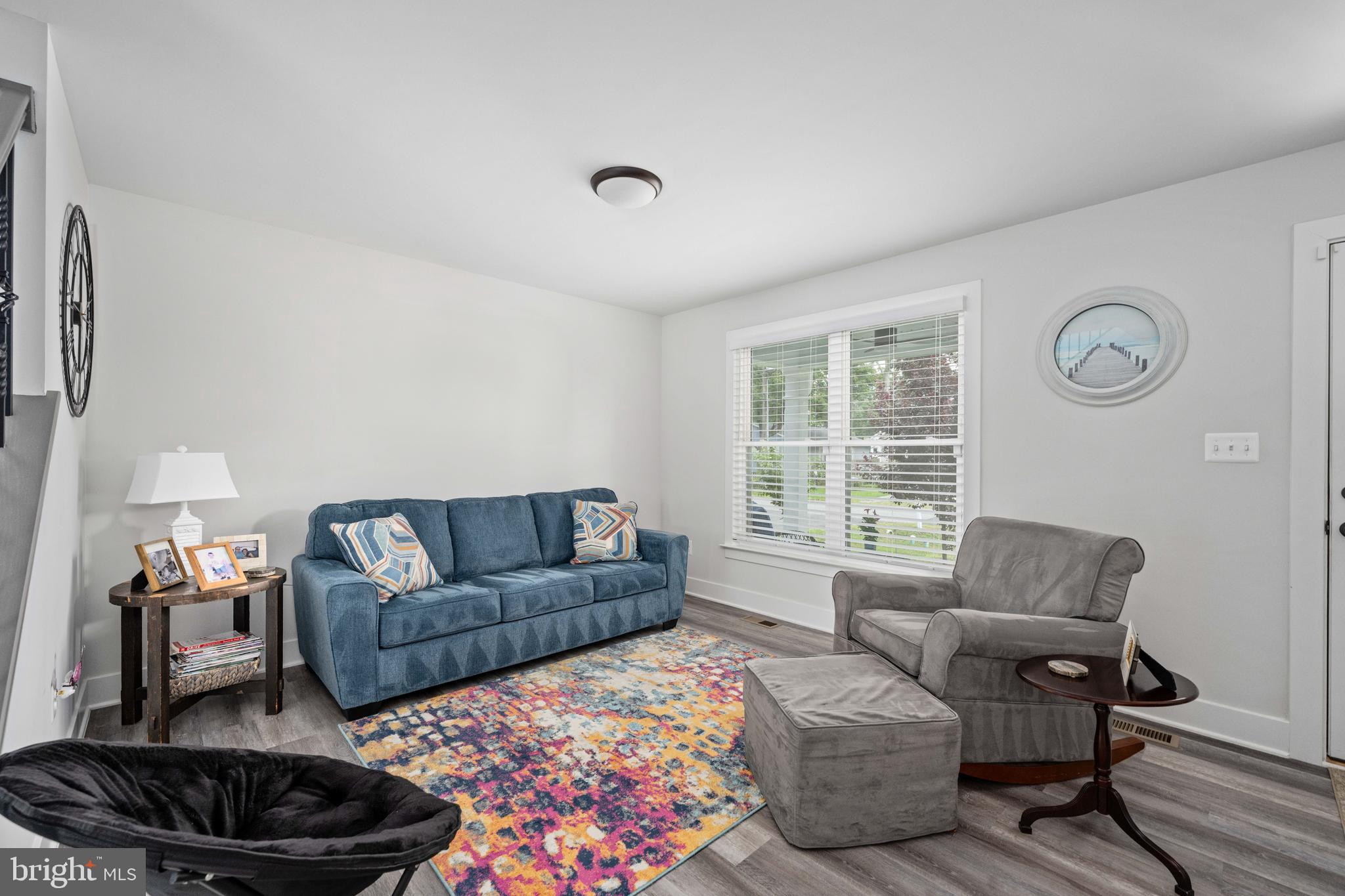 133 7th Street Colonial Beach, VA 22443 - Photo 17 of 72 a living room with furniture and a window