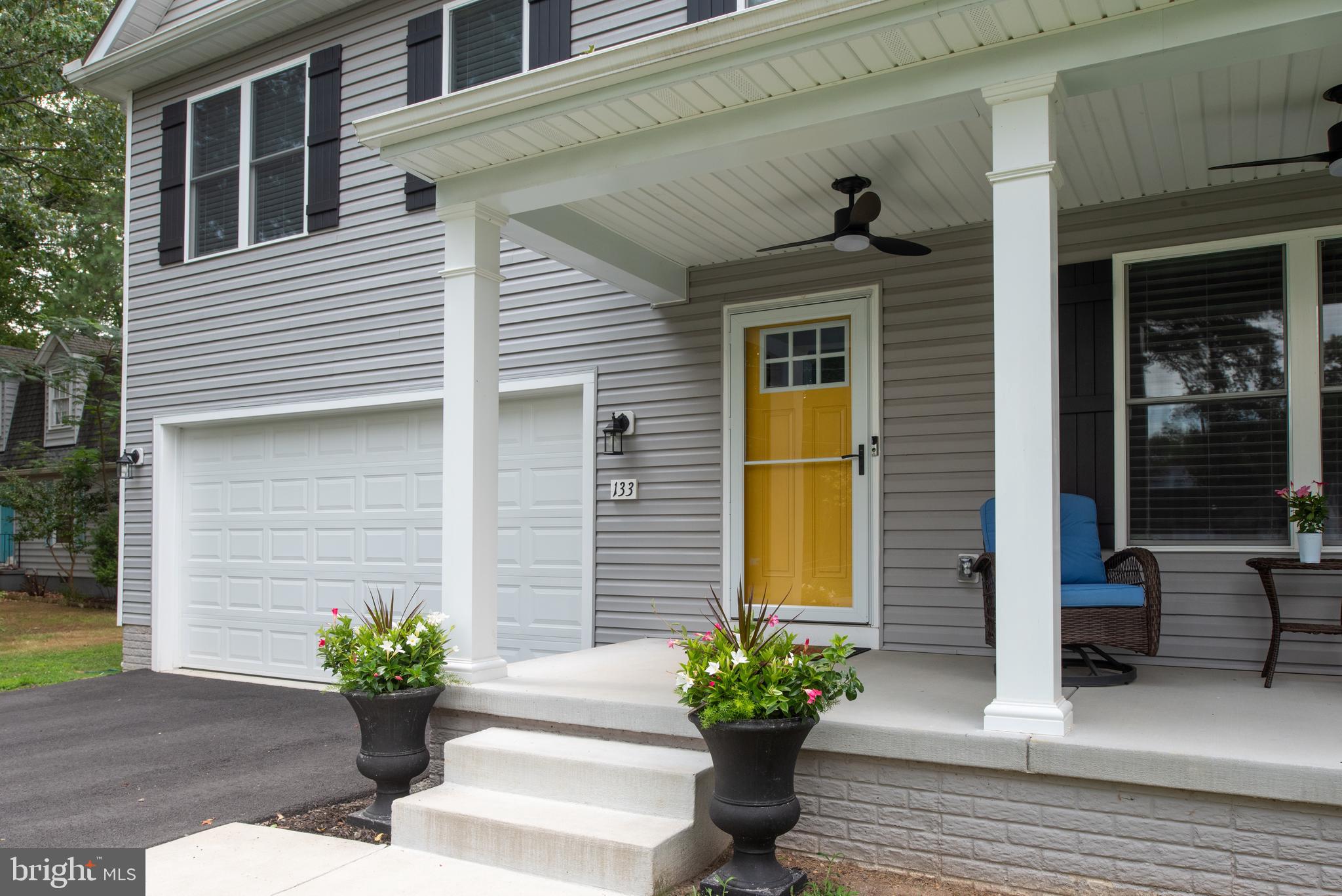 133 7th Street Colonial Beach, VA 22443 - Photo 2 of 72 a view of a entryway door front of house