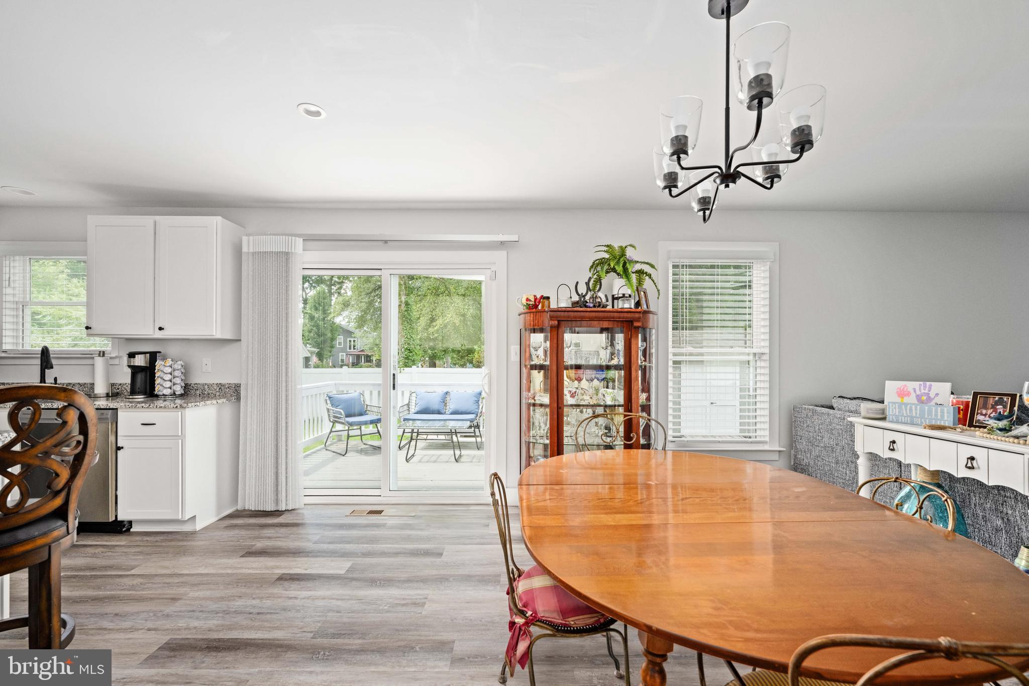 133 7th Street Colonial Beach, VA 22443 - Photo 22 of 72 a view of a dining room with furniture and window