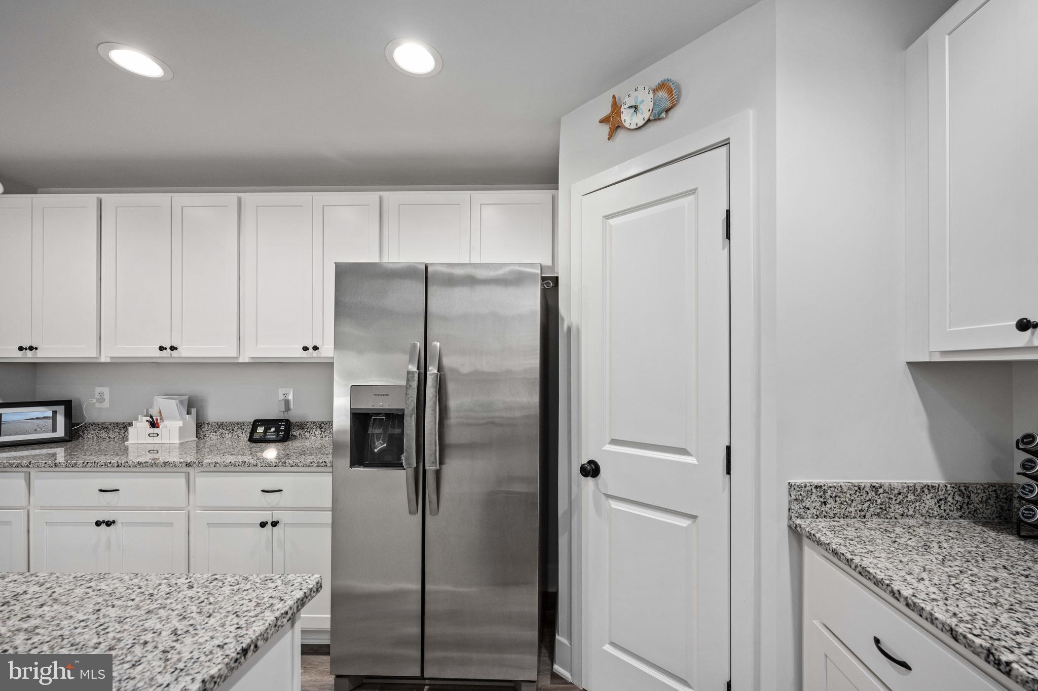 133 7th Street Colonial Beach, VA 22443 - Photo 30 of 72 Pantry to the right of refrigerator
