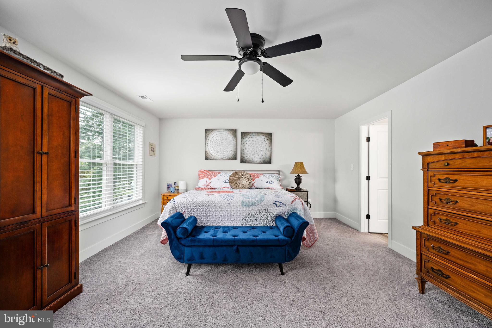 133 7th Street Colonial Beach, VA 22443 - Photo 34 of 72 a bedroom with a bed and a window