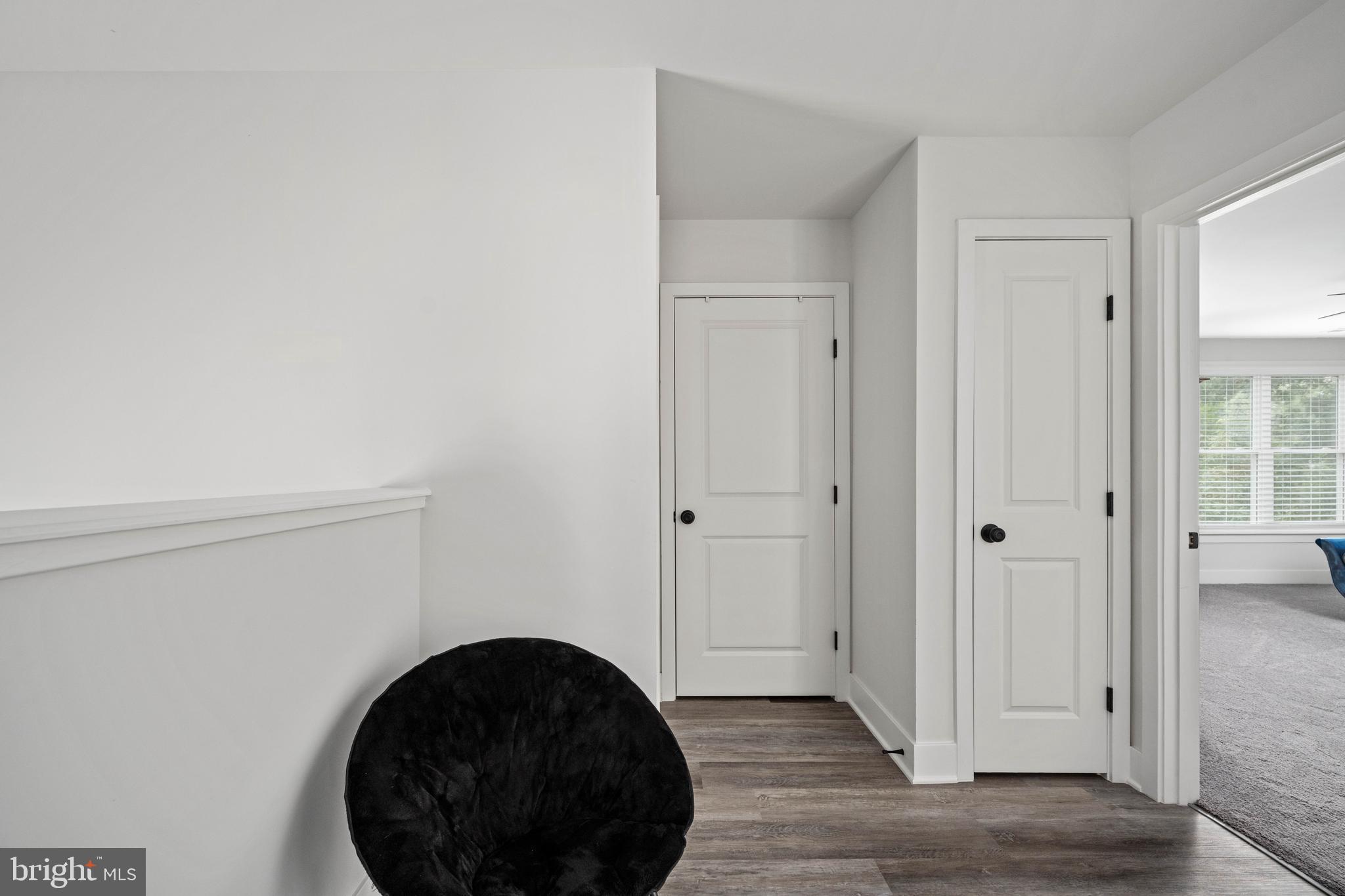 133 7th Street Colonial Beach, VA 22443 - Photo 54 of 72 a view of a closet and wooden floor