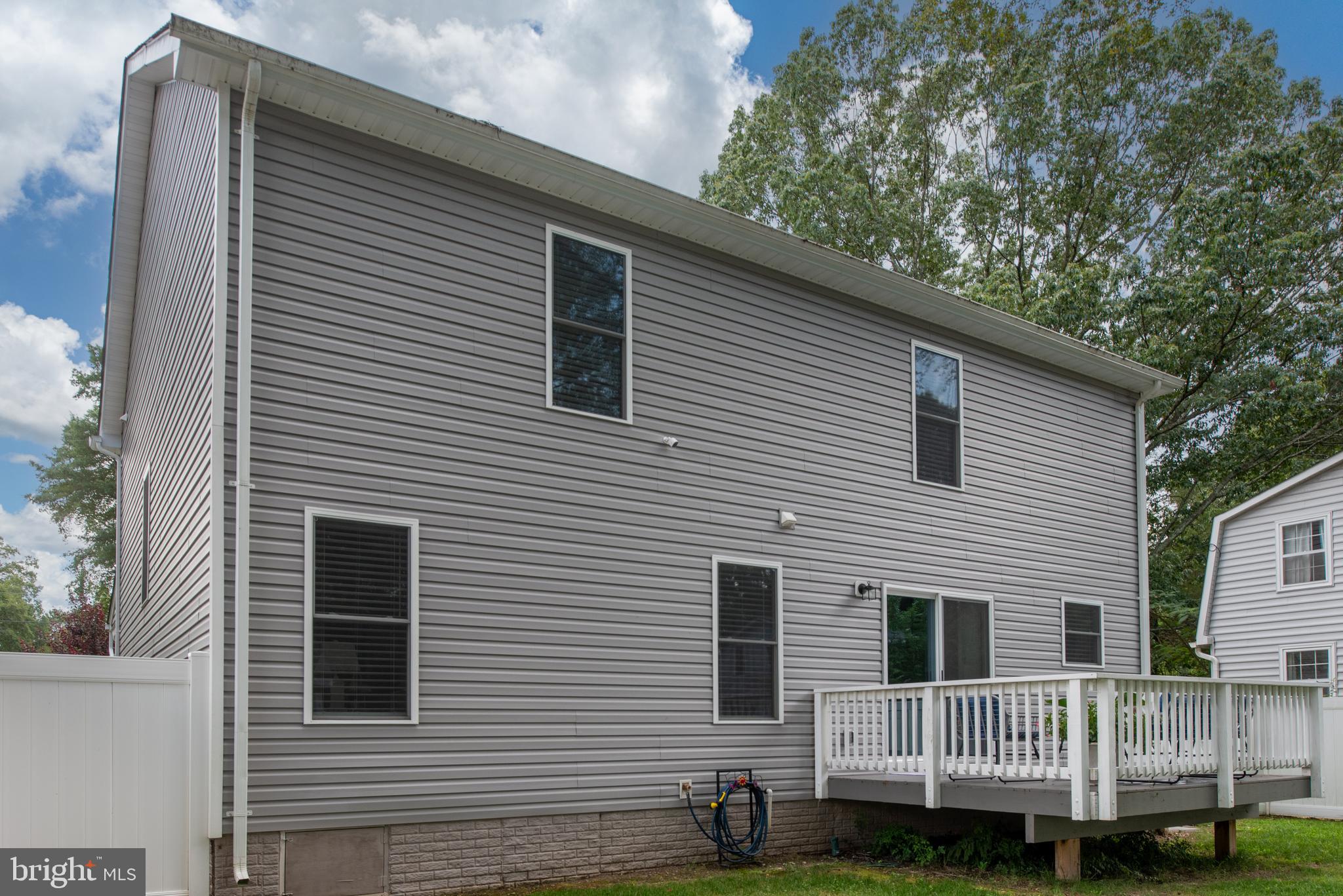 133 7th Street Colonial Beach, VA 22443 - Photo 57 of 72 a view of a house with a yard