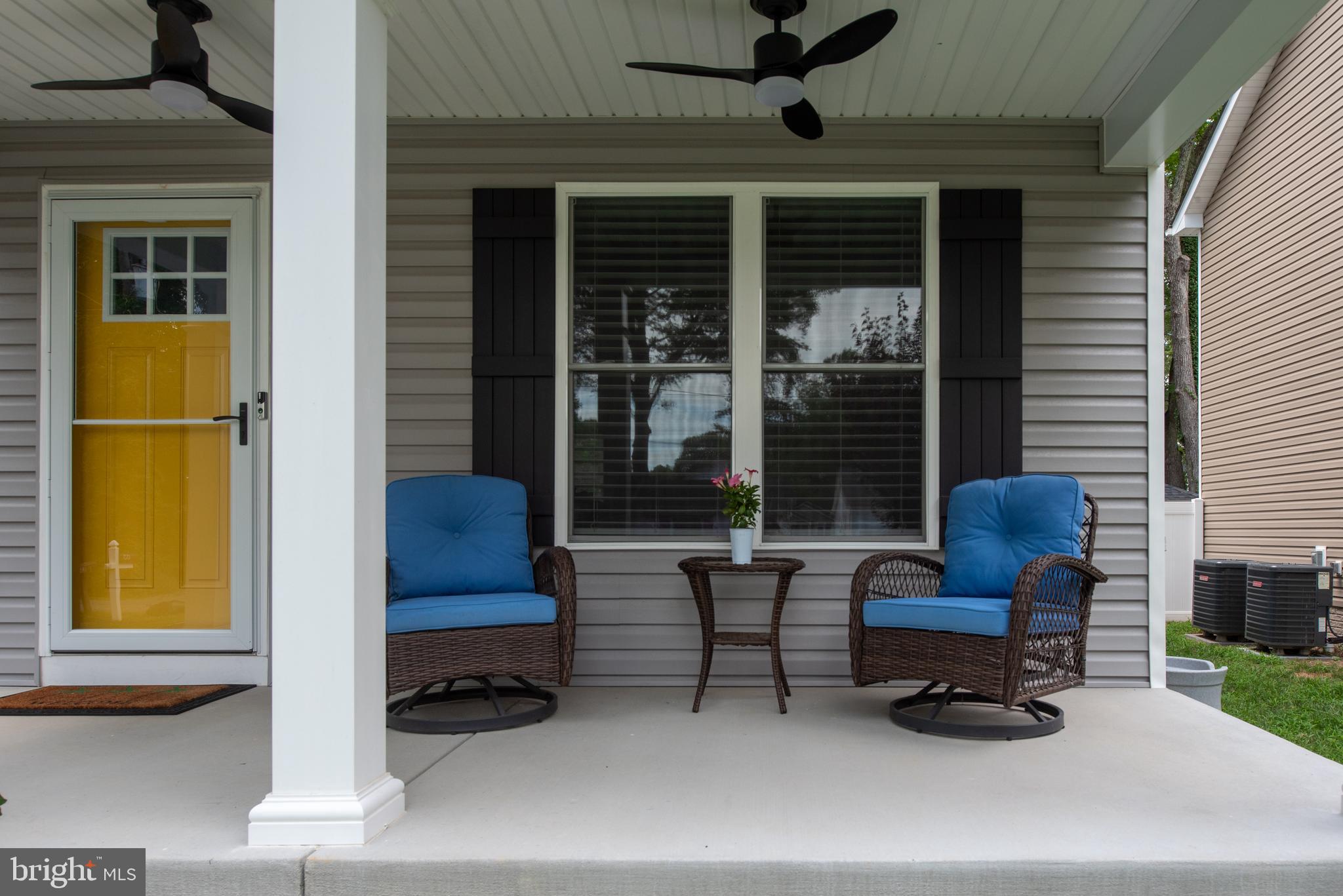 133 7th Street Colonial Beach, VA 22443 - Photo 6 of 72 a living room with furniture and a window