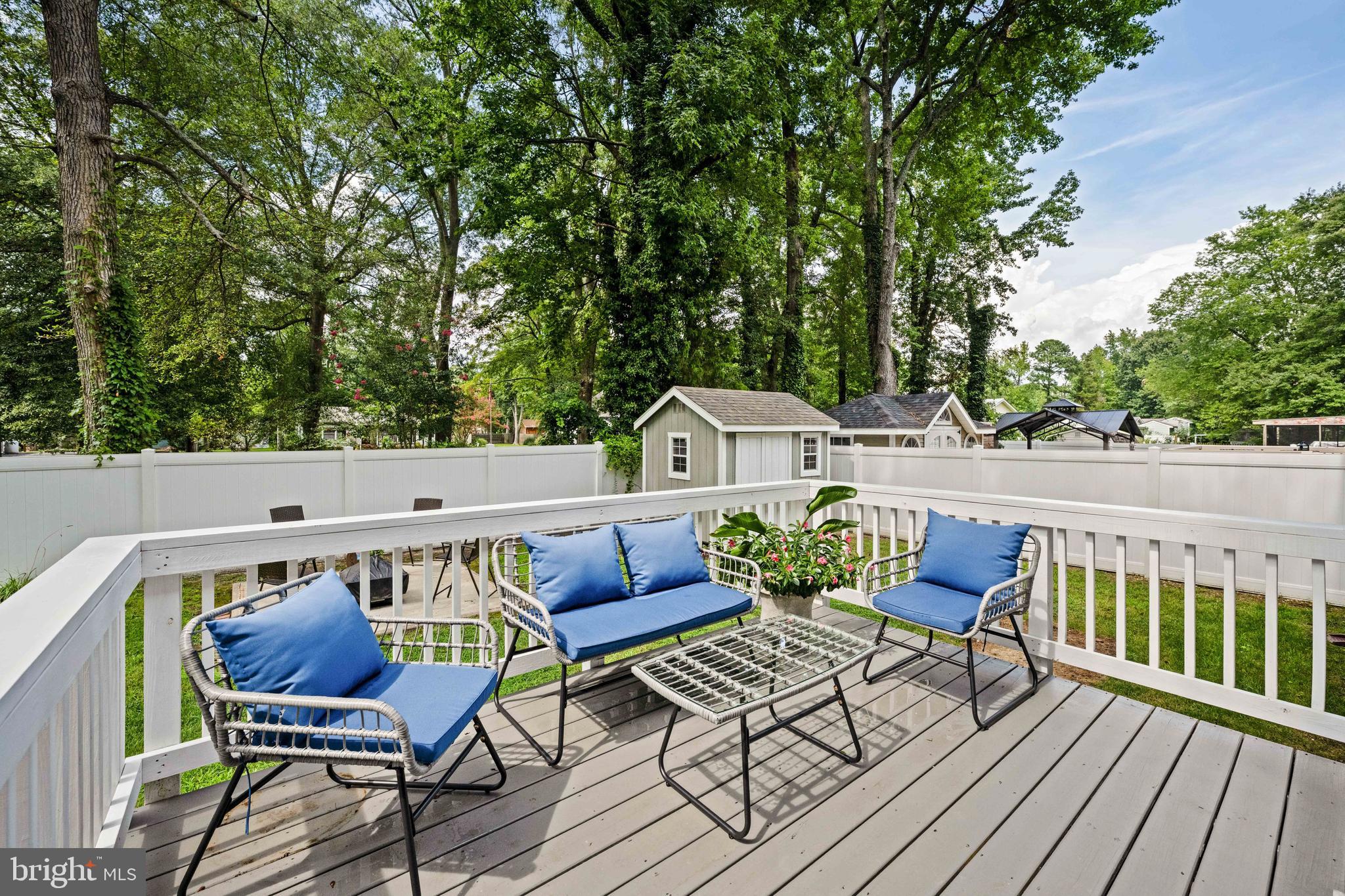 133 7th Street Colonial Beach, VA 22443 - Photo 9 of 72 a view of sitting area with furniture and wooden floor