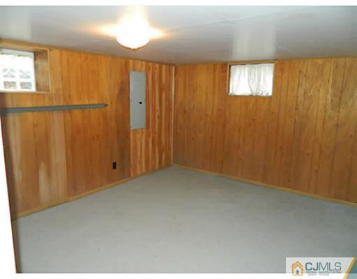 494 New Road Monmouth Junction, NJ 08852 - Photo 14 of 18 a view of an empty room with a window