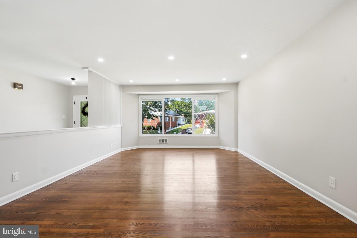 1446 Roxanna Road Northwest Washington, DC 20012 - Photo 5 of 32 Bright and airy open space awaits.