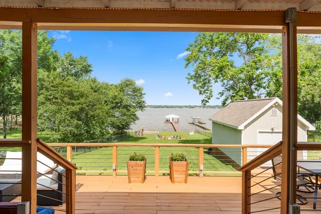 a view of swimming pool with seating space
