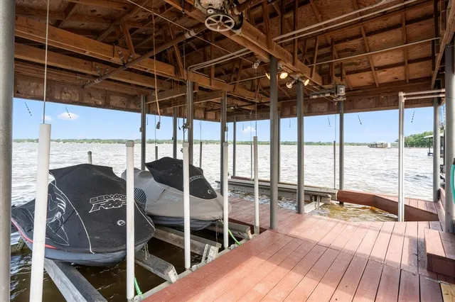 a view of a balcony with chairs