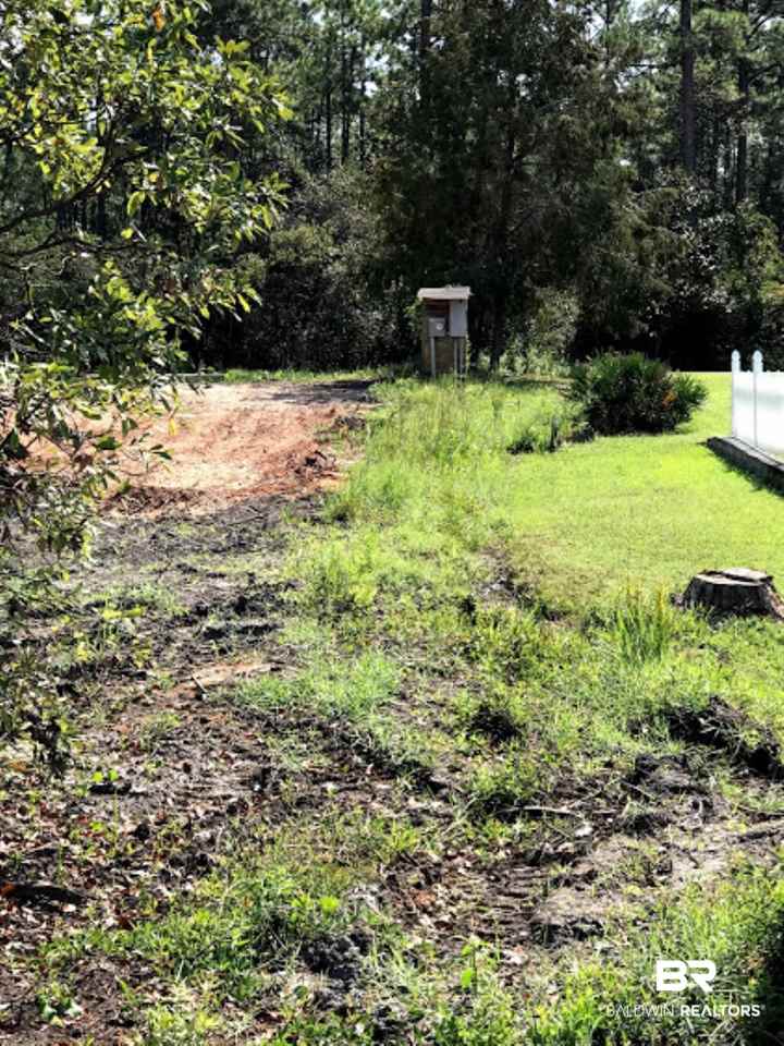 8411 Bay Harbor Road Elberta, AL 36530 - Photo 13 of 17 Power pole and meter installed on property