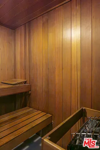 a bathroom with a sink and curtain