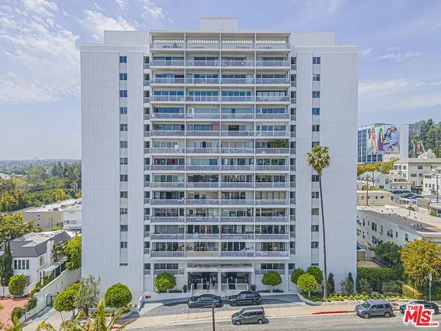 a front view of a building with street view