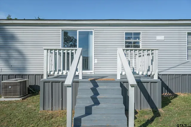 a view of stairs and living room