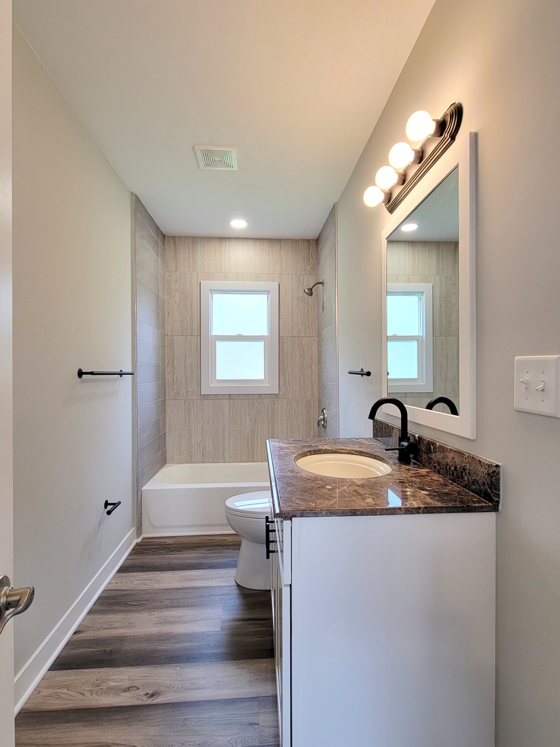 S333 Winfield Road Winfield, IL 60190 - Photo 9 of 37 a bathroom with a sink and a mirror