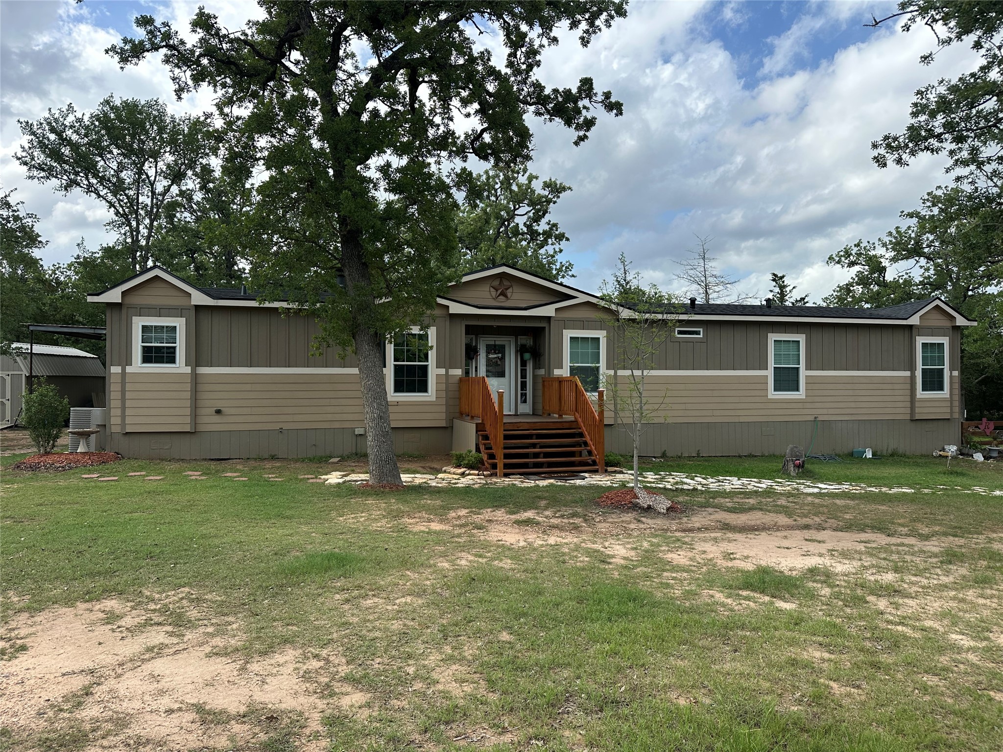 735 Boysenberry Road Somerville, TX 77879 - Photo 1 of 36 a view of a house with a yard