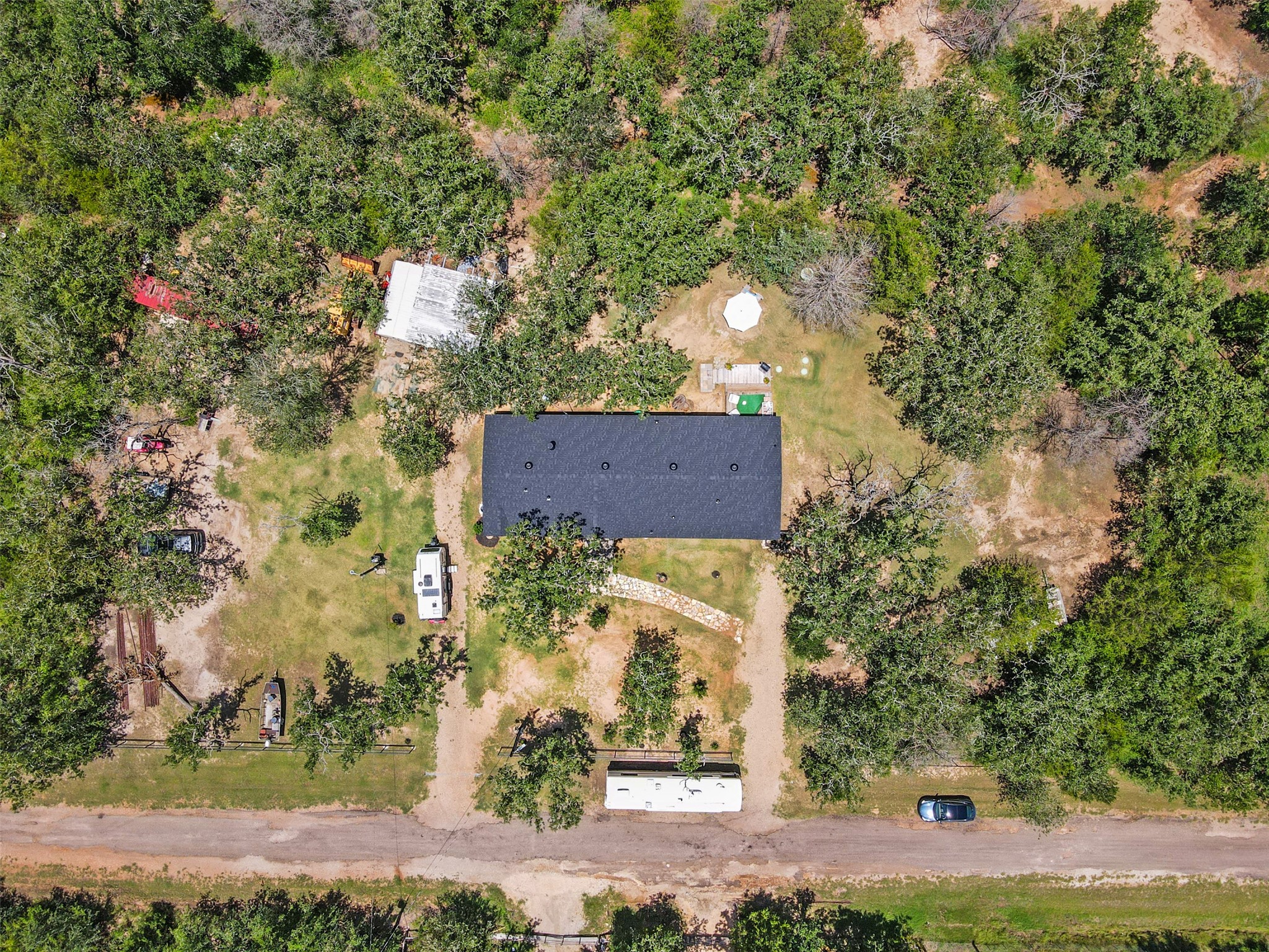 735 Boysenberry Road Somerville, TX 77879 - Photo 26 of 36 front view of a house with a yard