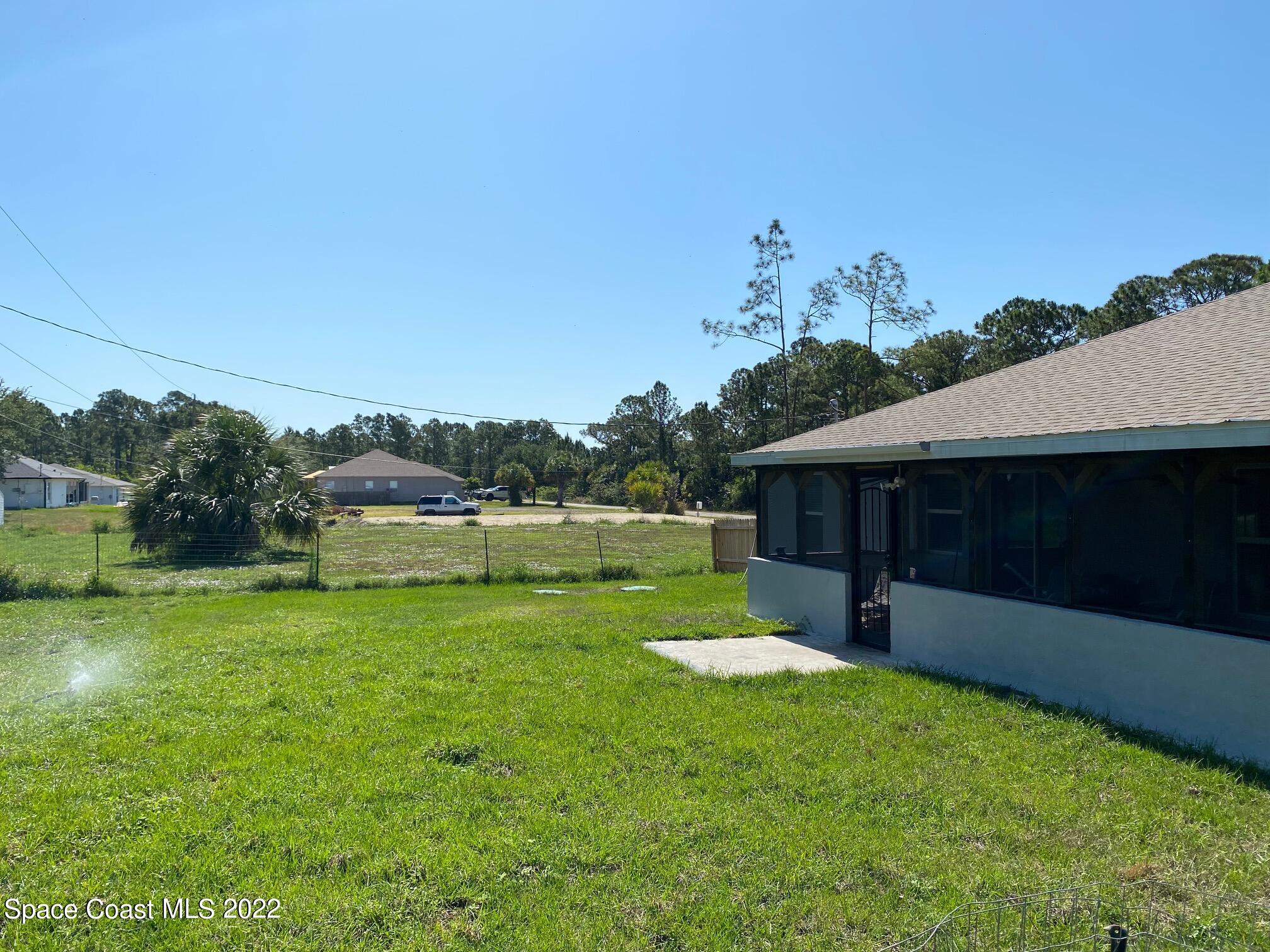 171 Labra Road Palm Bay, FL 32908 - Photo 25 of 28 21 Labra Rear2
