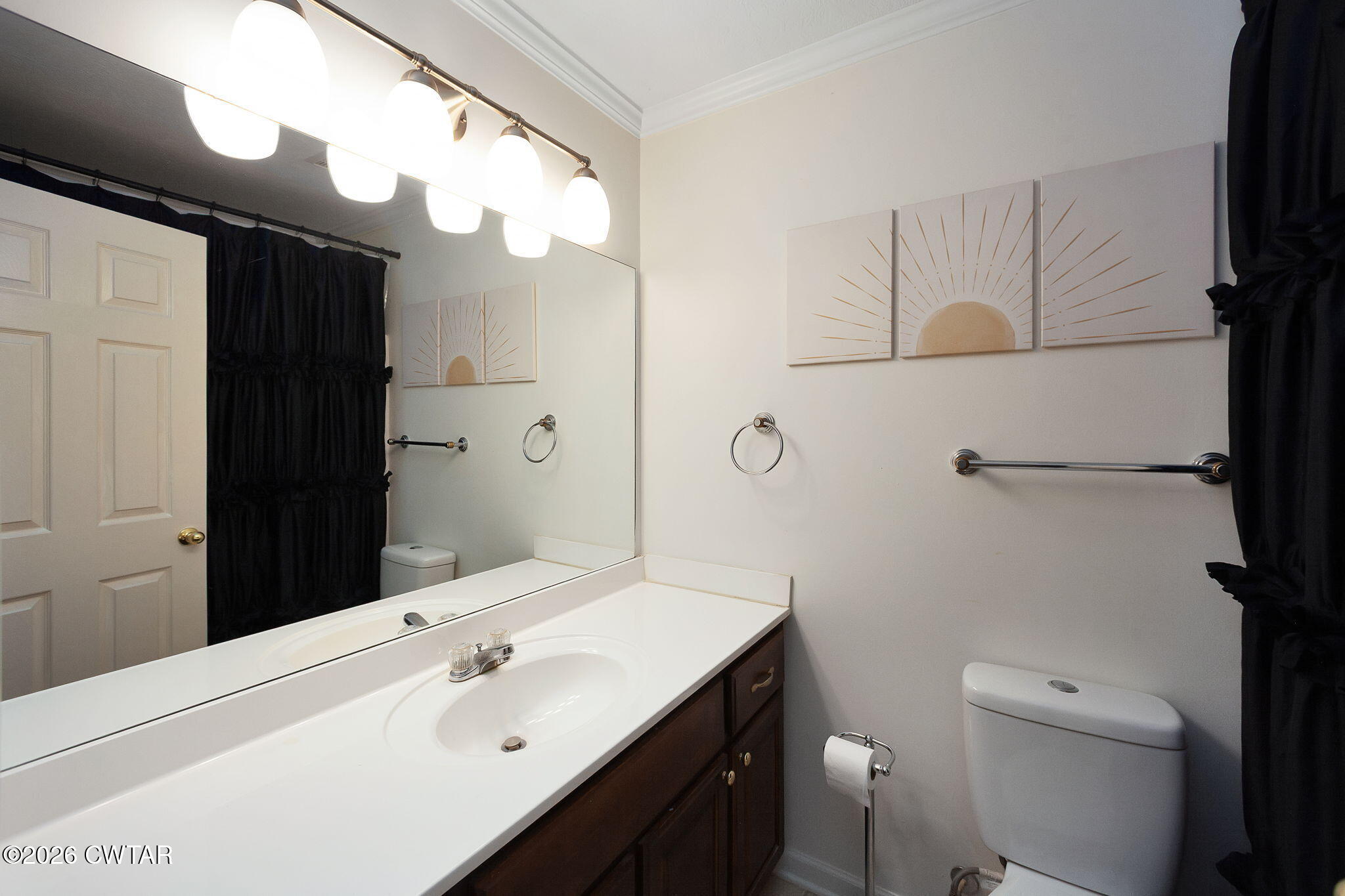 80 Rooker Drive Jackson, TN 38305 - Photo 20 of 30 a bathroom with a sink a toilet and shower