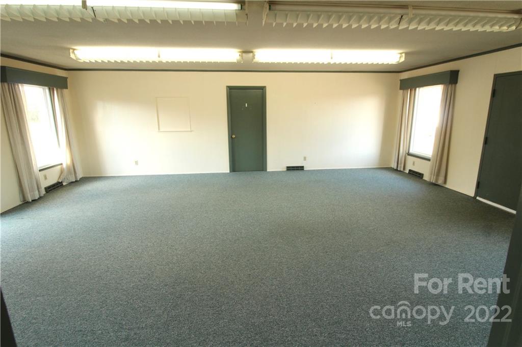 204 Church Street Clover, SC 29710 - Photo 2 of 10 a view of an empty room with a window
