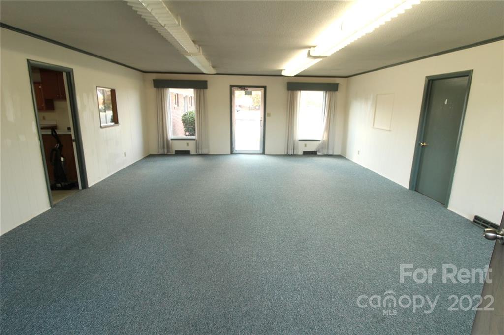 204 Church Street Clover, SC 29710 - Photo 3 of 10 a view of empty room with windows