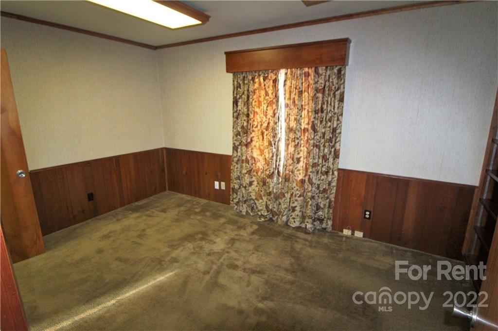 204 Church Street Clover, SC 29710 - Photo 9 of 10 a view of an empty room with a window