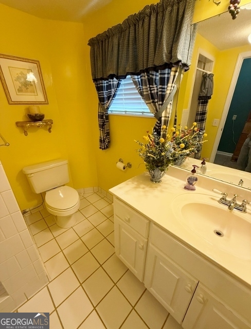 7586 Eastman Road Soperton, GA 30457 - Photo 16 of 29 a bathroom with a sink and a mirror