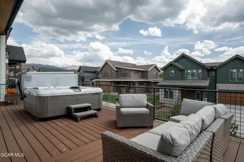 a view of a roof deck with couches