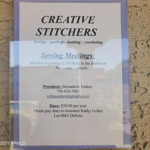 a sign on a kitchen next to a wall