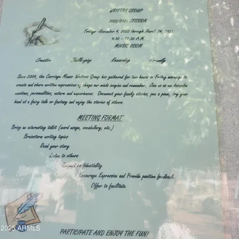 a view of a dining room with furniture and a rug