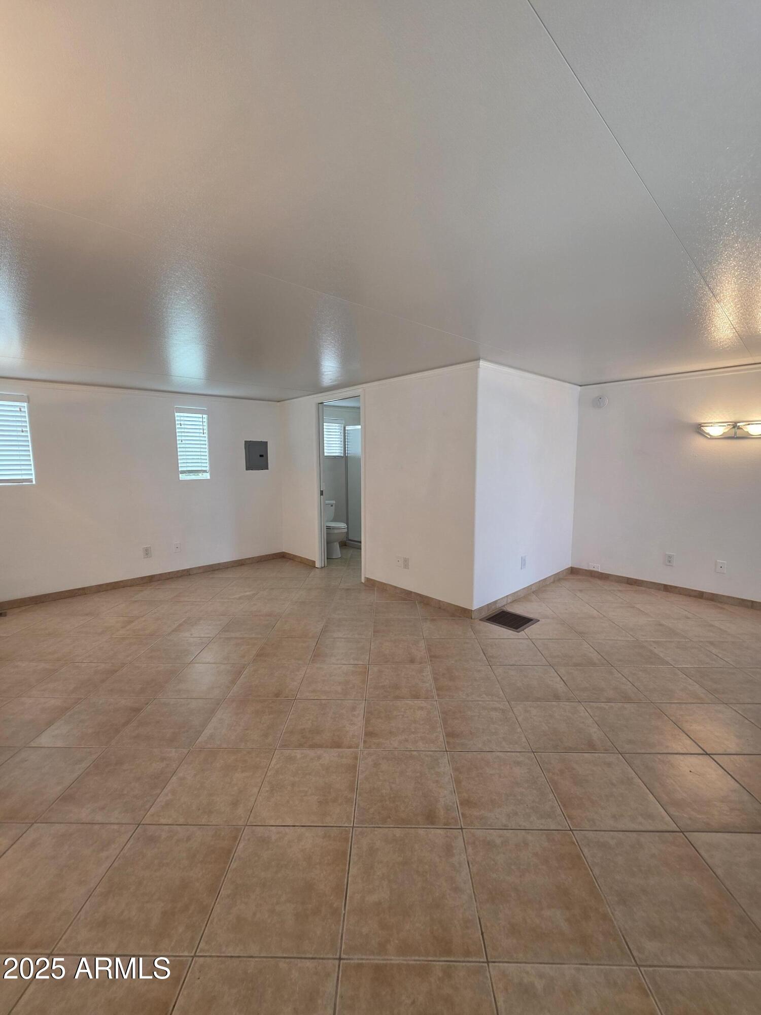7750 East Broadway Road, Unit LOT 619 Mesa, AZ 85208 - Photo 9 of 33 a view of an empty room