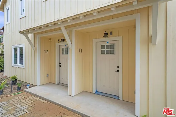 a view of a front door and porch