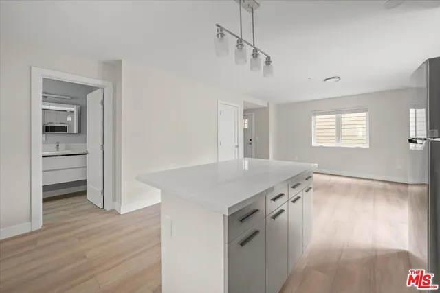 a bathroom with a sink toilet and vanity