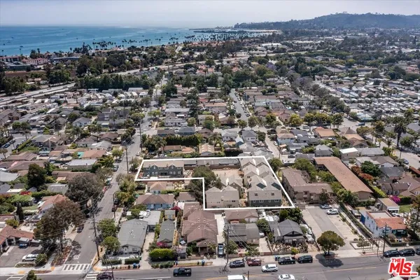 an aerial view of a city with lots of residential buildings