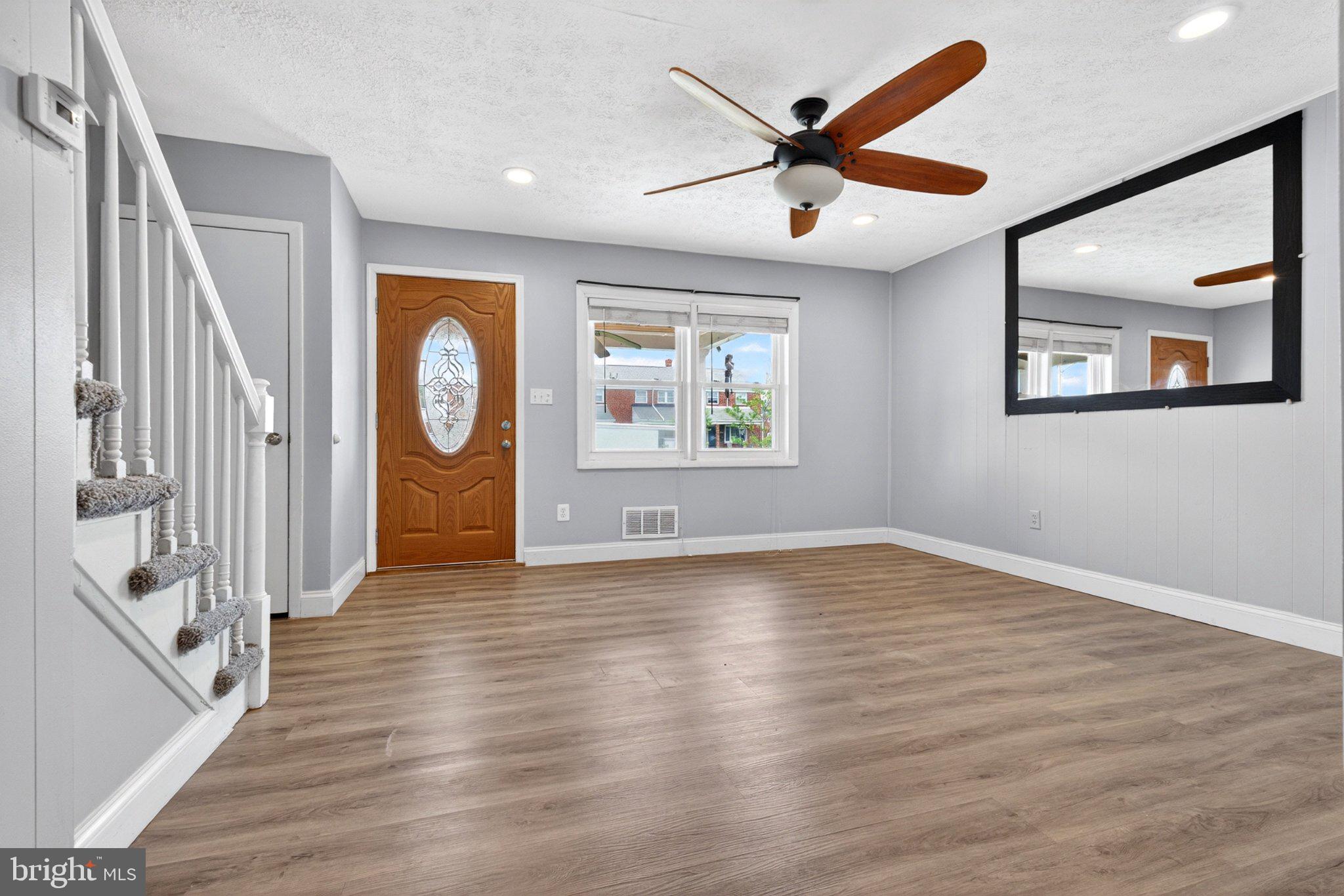 7729 Charlesmont Road Baltimore, MD 21222 - Photo 9 of 38 Bright and airy living space awaits.