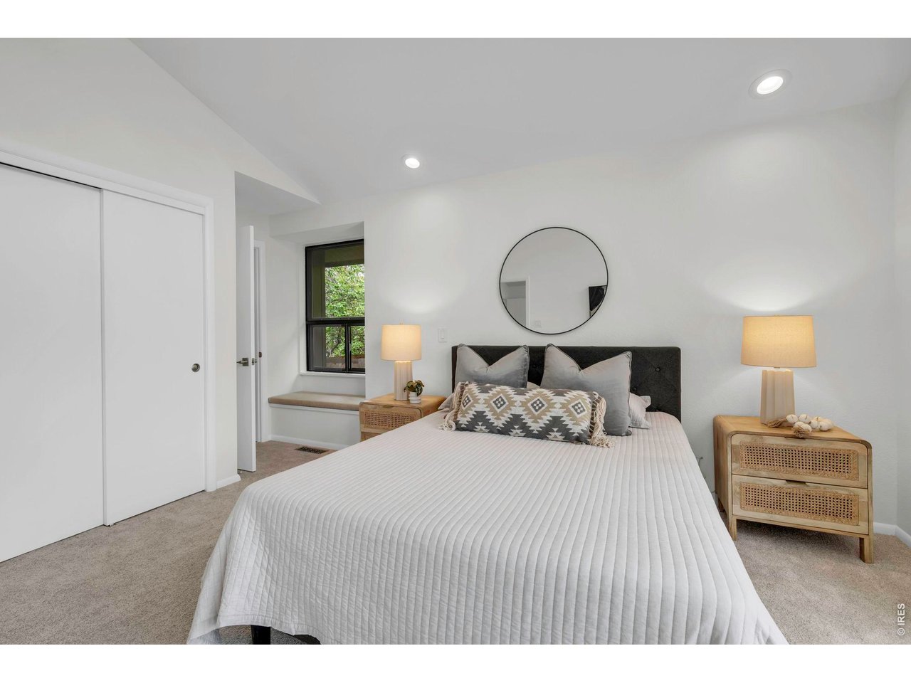 3545 Clover Circle Boulder, CO 80304 - Photo 19 of 36 a bedroom with a bed and a large window
