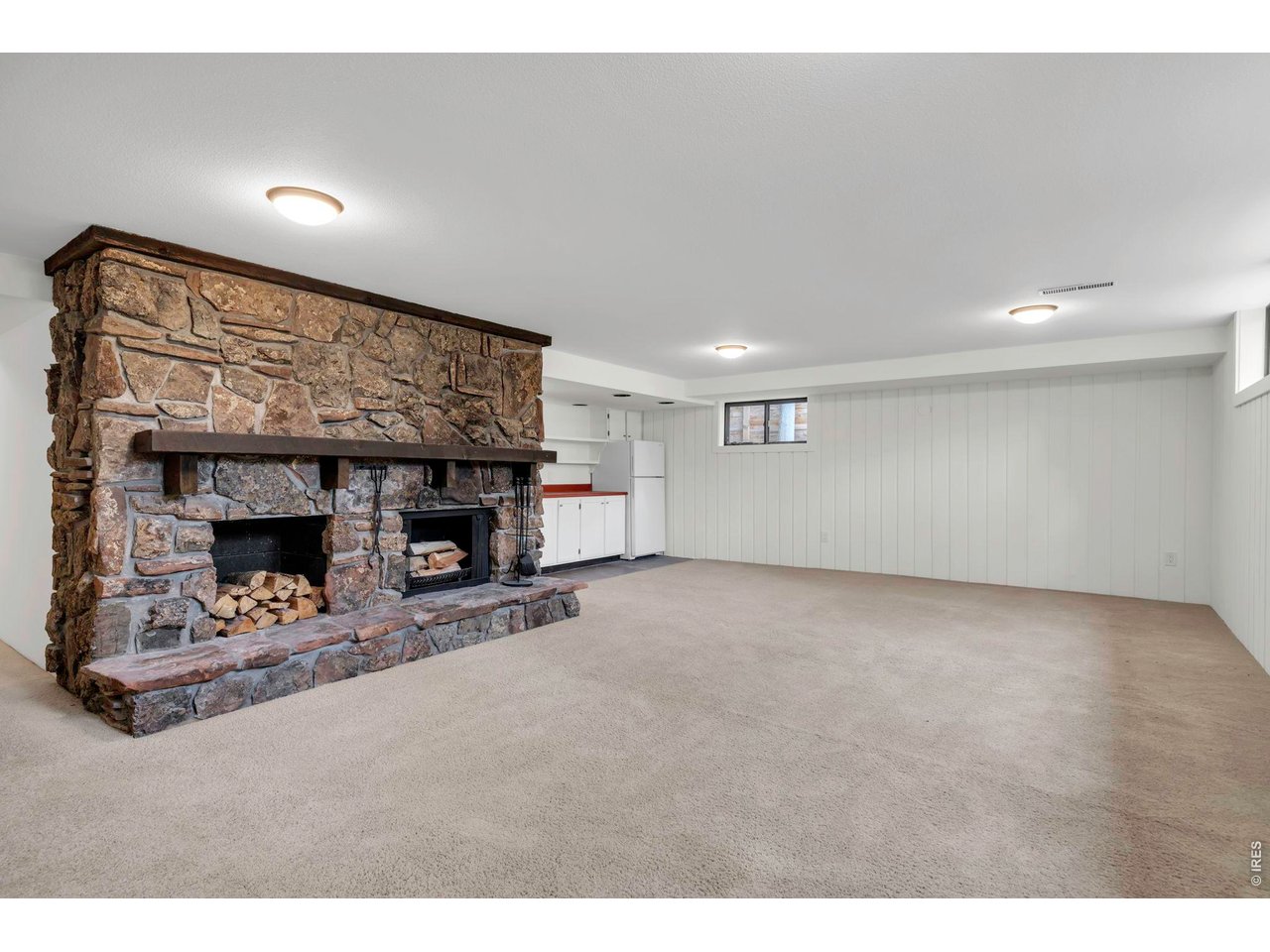 3545 Clover Circle Boulder, CO 80304 - Photo 29 of 36 a view of an empty room with a fireplace