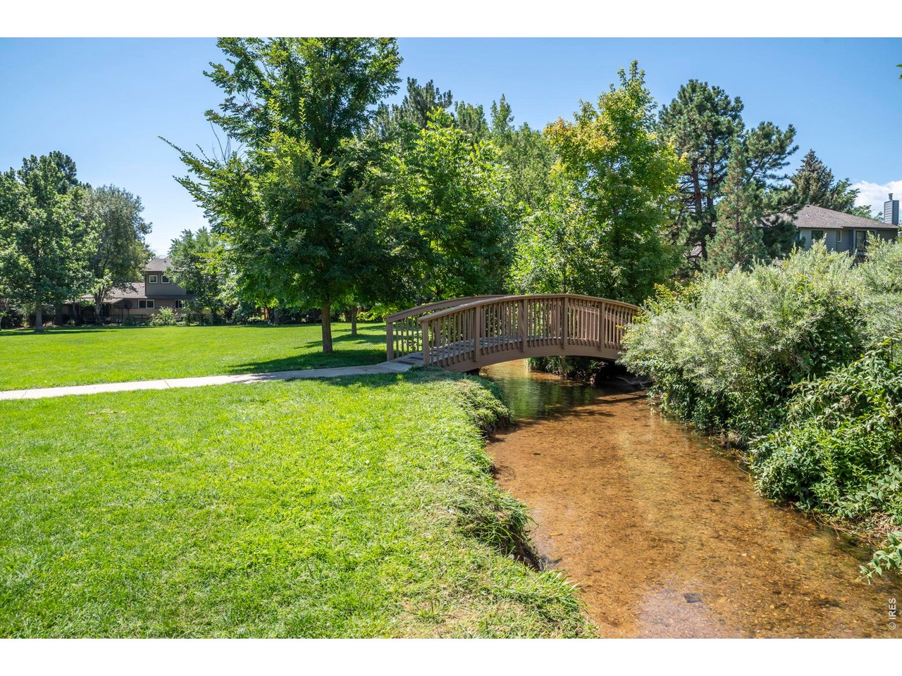 3545 Clover Circle Boulder, CO 80304 - Photo 34 of 36 a backyard of a house with a yard and sitting area