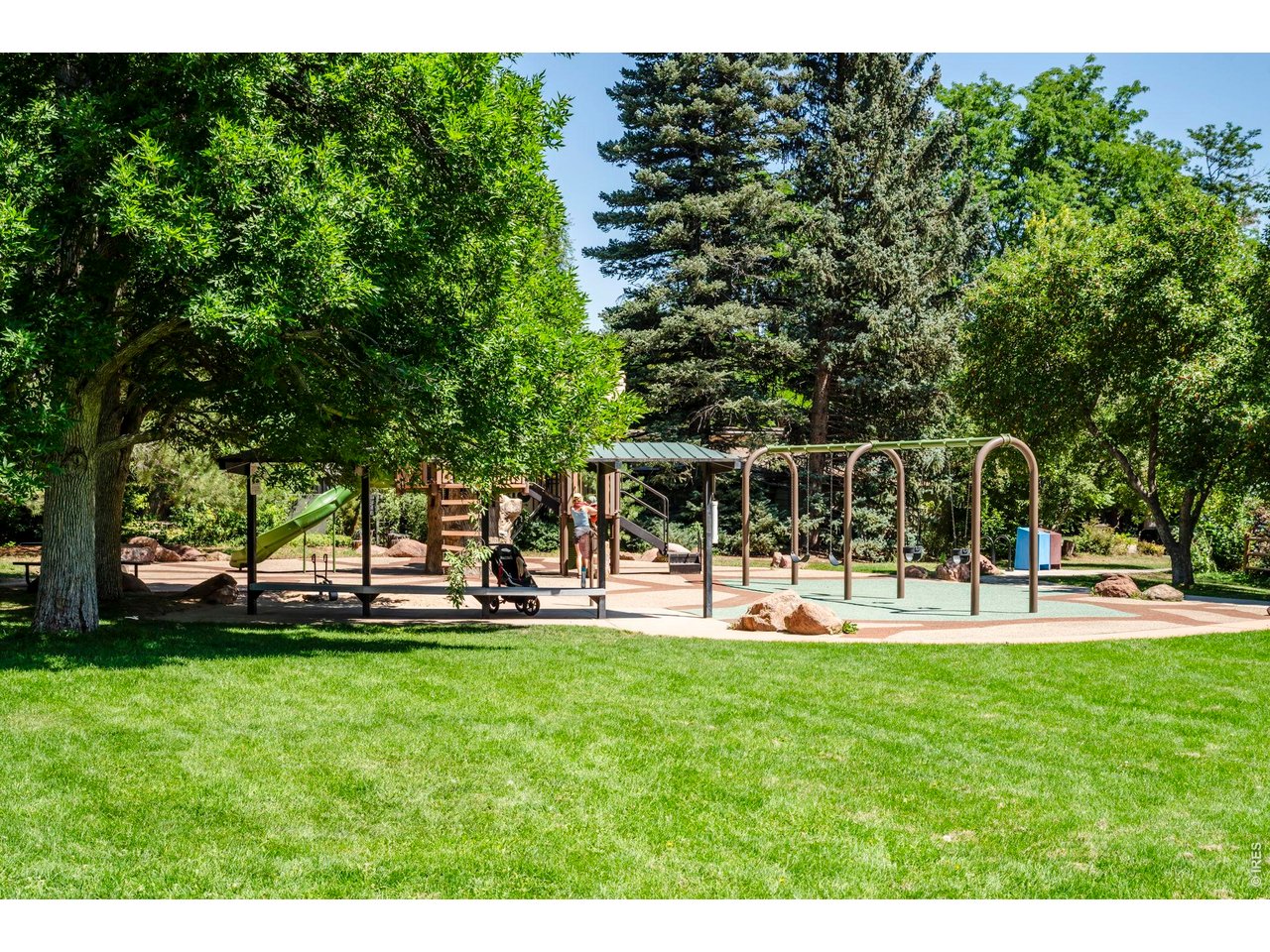 3545 Clover Circle Boulder, CO 80304 - Photo 36 of 36 a view of a park with lawn chairs and large trees
