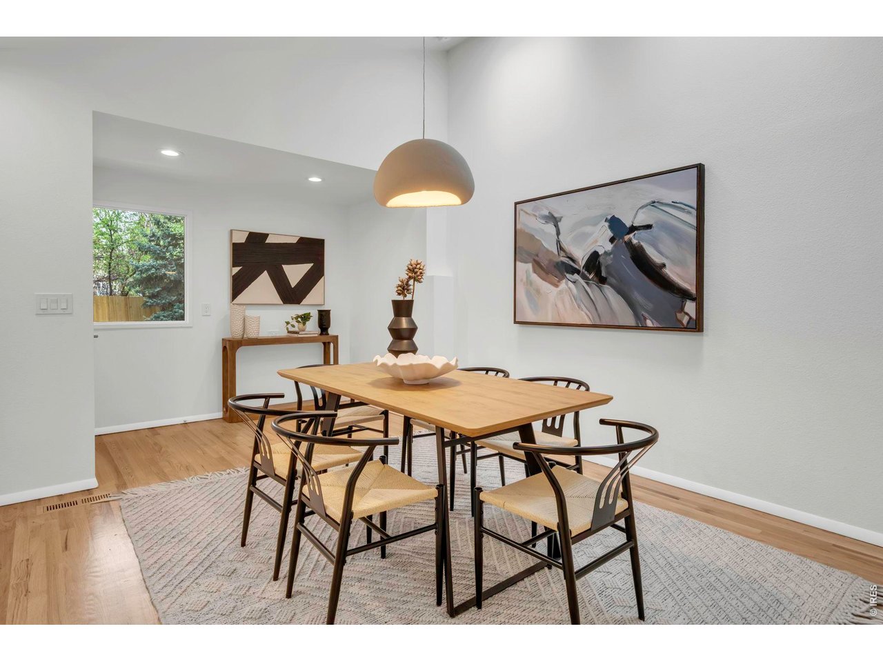 3545 Clover Circle Boulder, CO 80304 - Photo 7 of 36 a view of a dining room with furniture and wooden floor