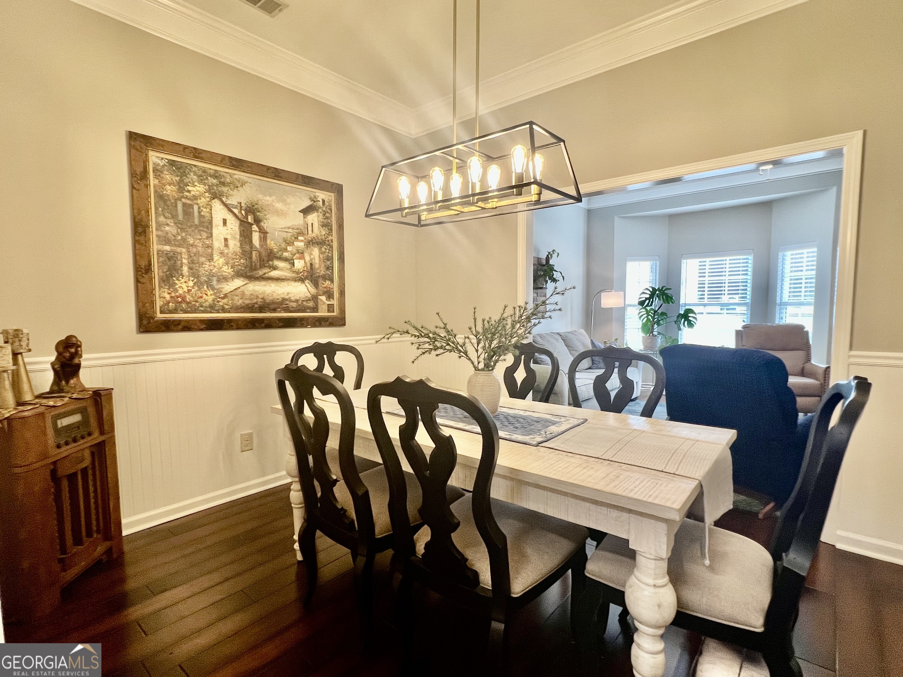 122 Millers Lane Calhoun, GA 30701 - Photo 12 of 60 a view of a dining room with furniture wooden floor and a chandelier
