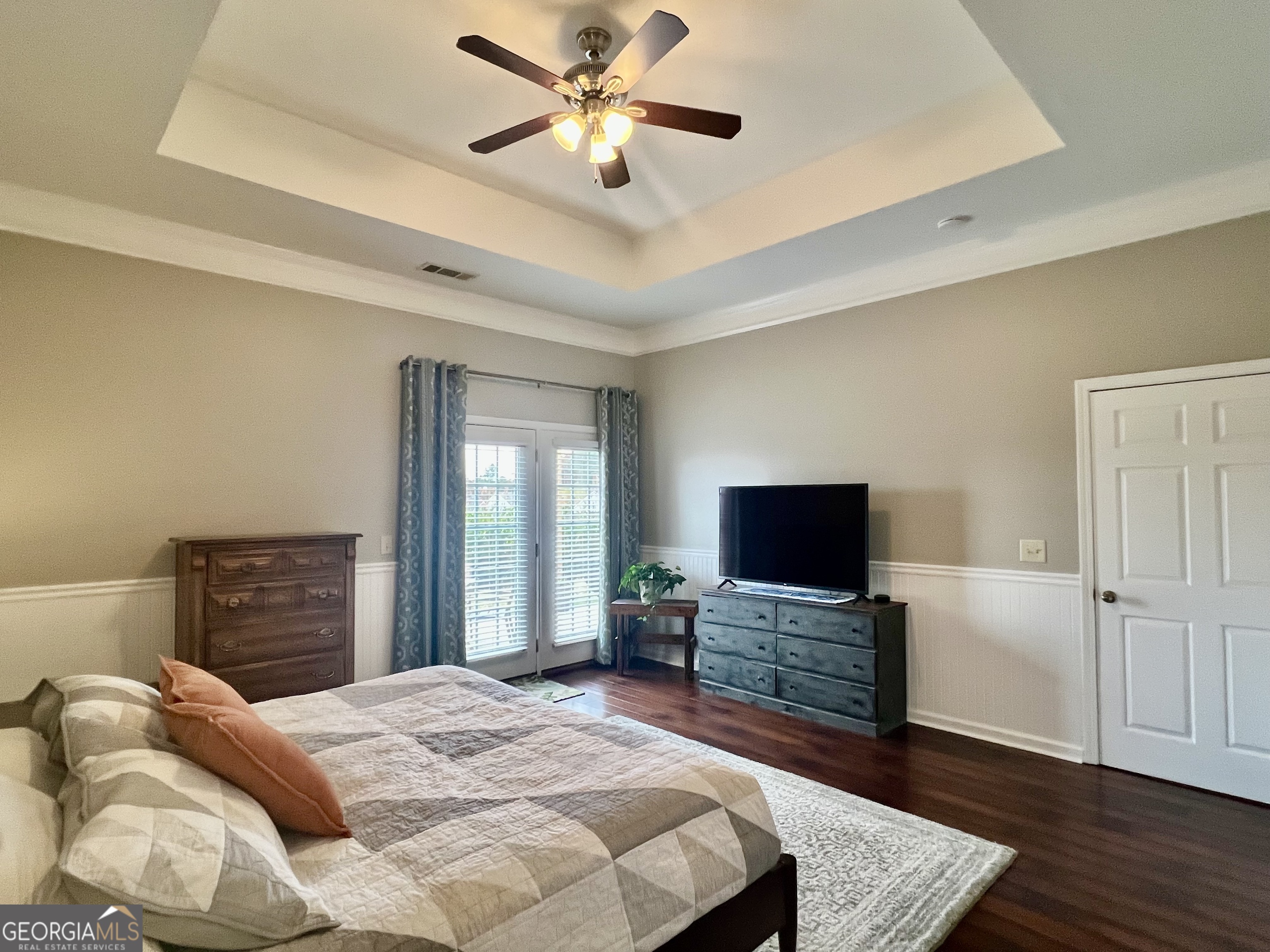 122 Millers Lane Calhoun, GA 30701 - Photo 24 of 60 a bedroom with a bed and a flat screen tv