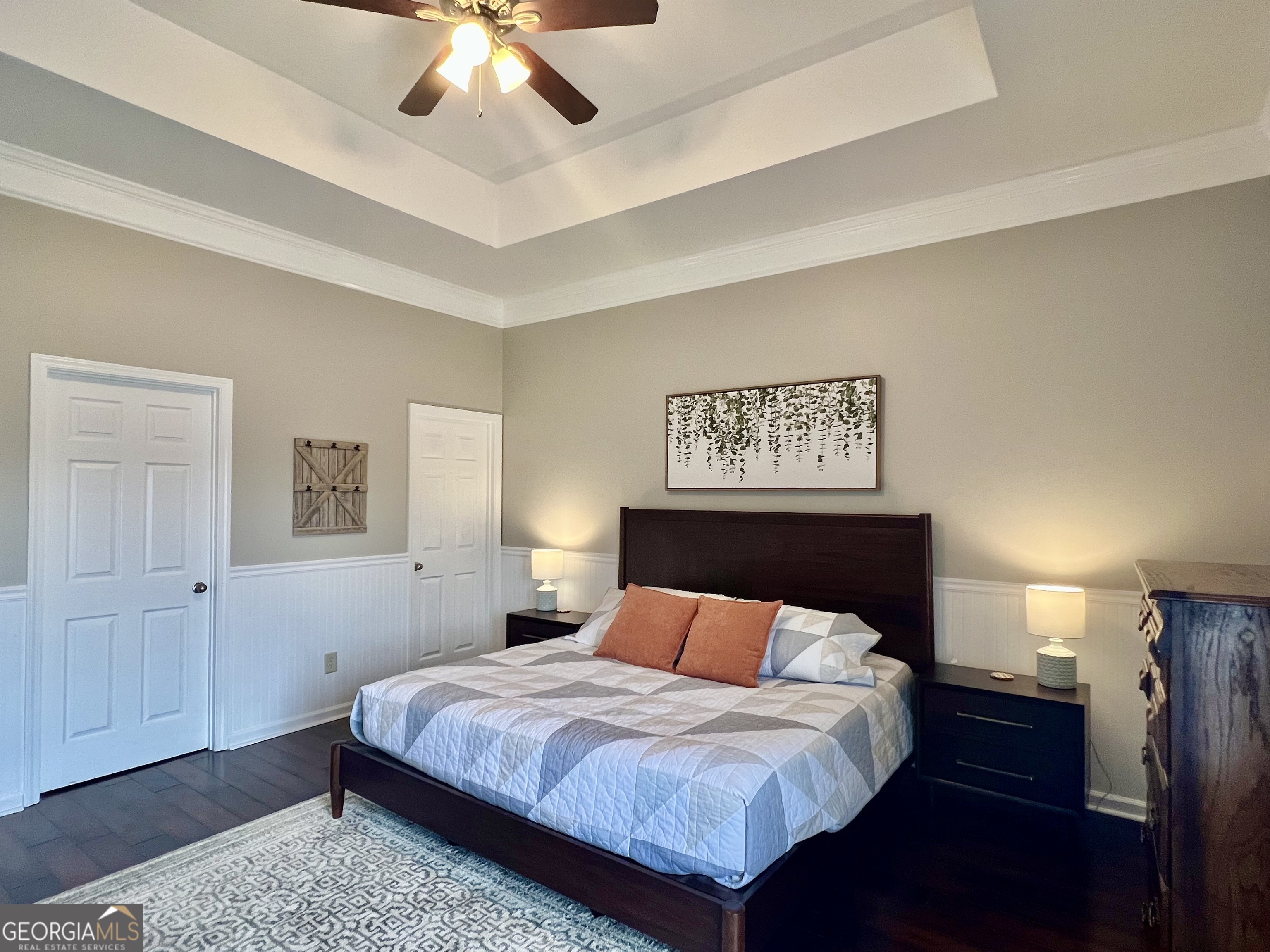 122 Millers Lane Calhoun, GA 30701 - Photo 27 of 60 a bedroom with a large bed and a chandelier